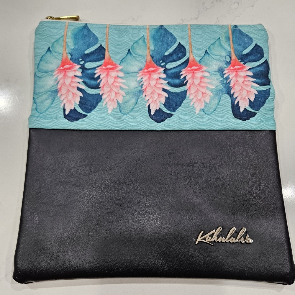 KAHULALEA CLUTCH  in a beautiful pink ginger and Green monstera leaf design.
